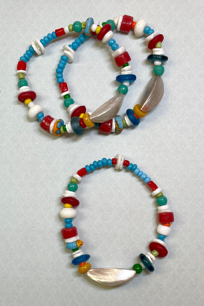This bracelet was made by combining a unique combination of recycled glass African Beads