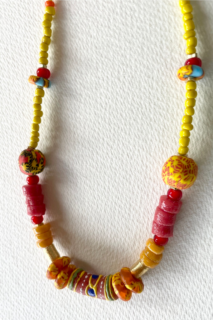 necklace is from our exclusive range of jewellery highlighting the beautiful African recycled powder glass beads made by the people of Krobo Mountain in Ghana
