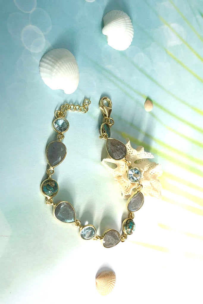 An ultra fine gold vermeil bracelet dotted with London blue Topaz, Labradorite and Turquoise composite.  
