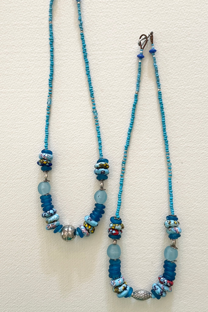 This necklace is from our exclusive range of jewellery highlighting the beautiful African recycled powder glass beads made by the people of Krobo Mountain in Ghana, West Africa.