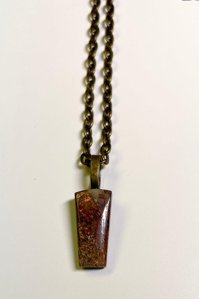 This piece of Australian Opal is from Winton, piece of Boulder Opal was mined, cut and polished in Queensland.