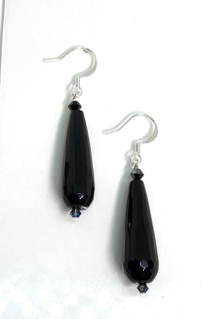 teardrop style statement earrings are made from natural stone 