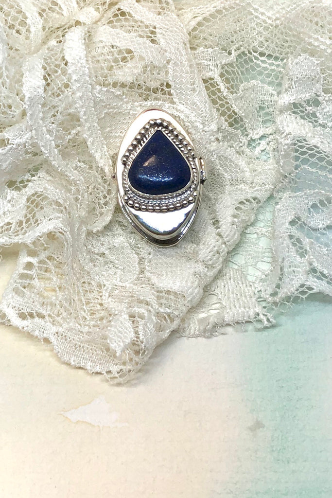 Echo Silver Box Lapis Lazuli inlaid Lid is a silver pill box inlaid with a triangular cabachon of Lapis Lazuli on the lid.