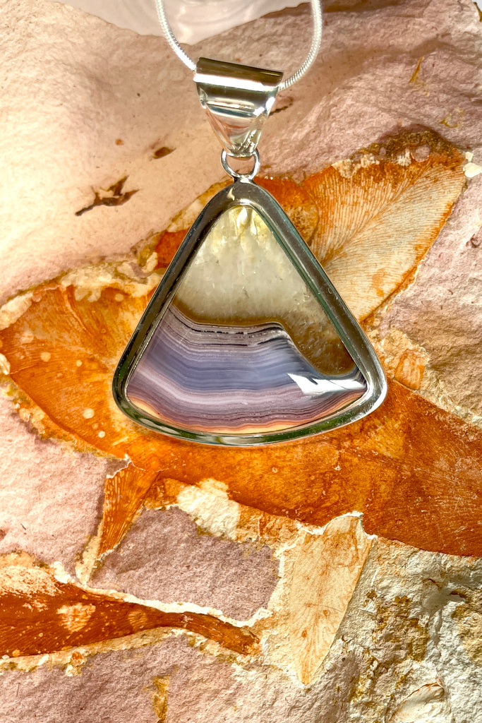 A modernist setting in an exclusive design, the Mexican Agate stone was cut and polished by a local Sunshine Coast stone artist