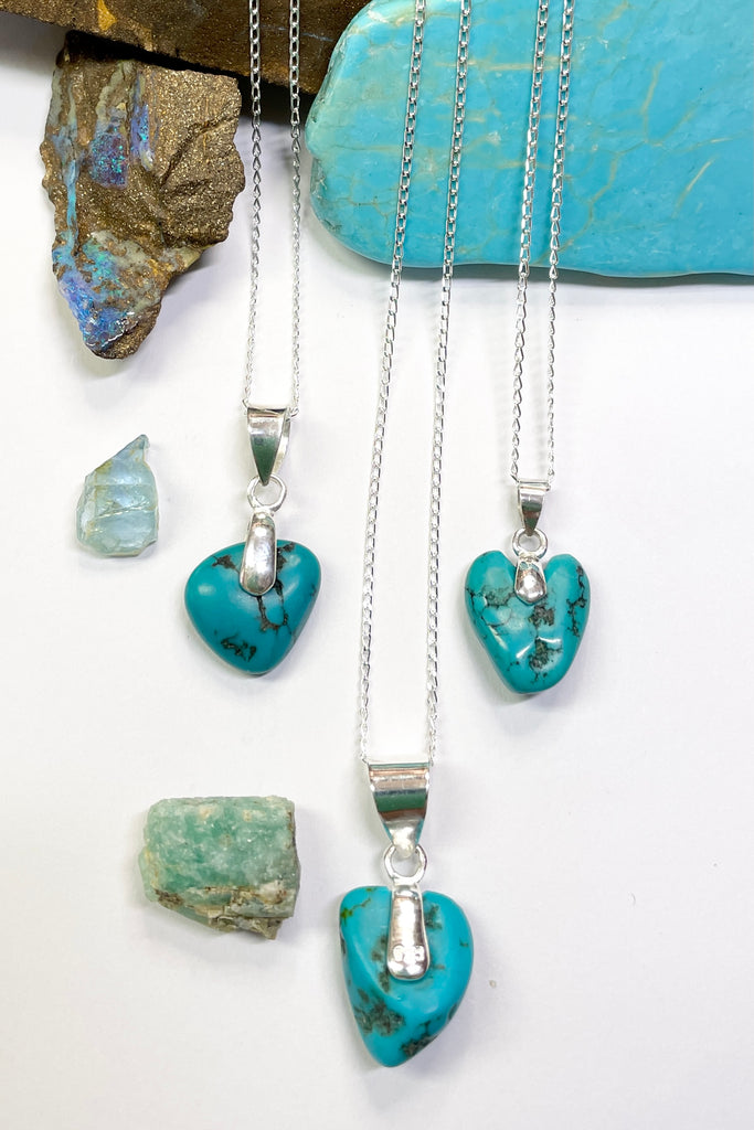 This lovely old turquoise pendant is a one off piece, hand carved into a rough heart shape