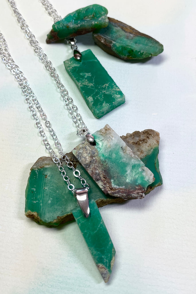 Chrysoprase in the raw, these rugged pendants were cut by a young local lapidarist to give a feel of the power of this gorgeous green stone.