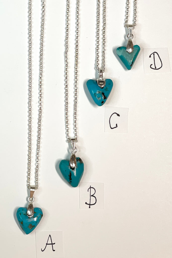 This lovely old turquoise pendant is a one off piece, hand carved into a rough heart shape 