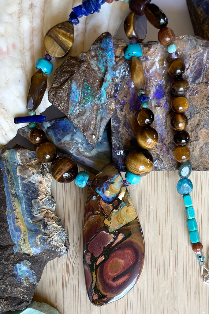 This necklace has been designed using natural Opal and many different semi precious gemstones