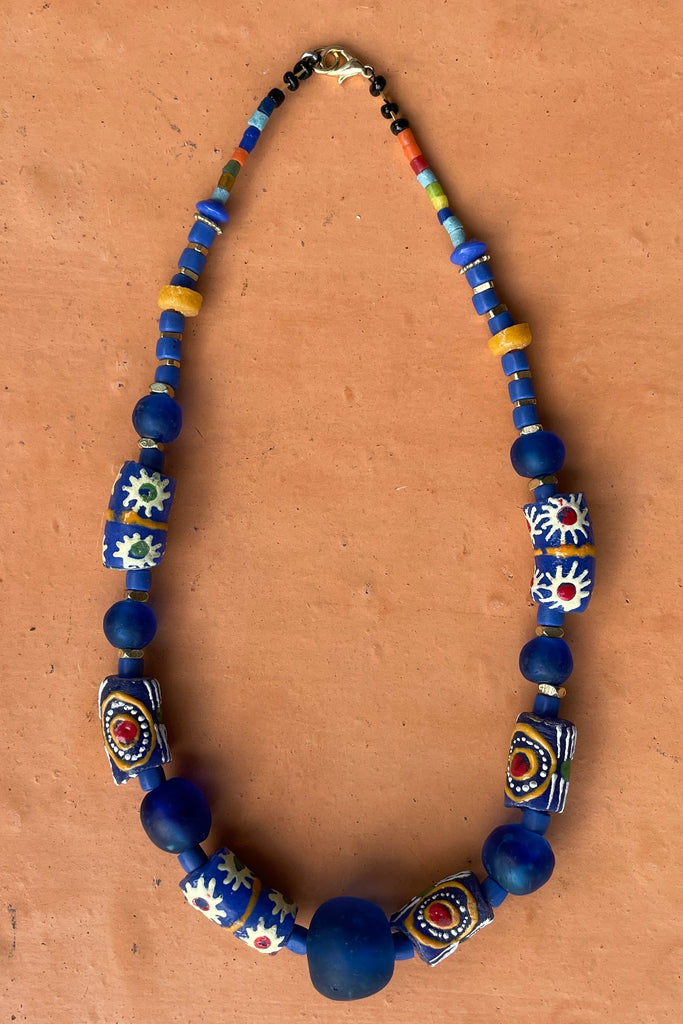 This necklace is from our exclusive range of jewellery highlighting the beautiful African recycled powder glass beads made by the people of Krobo Mountain in Ghana