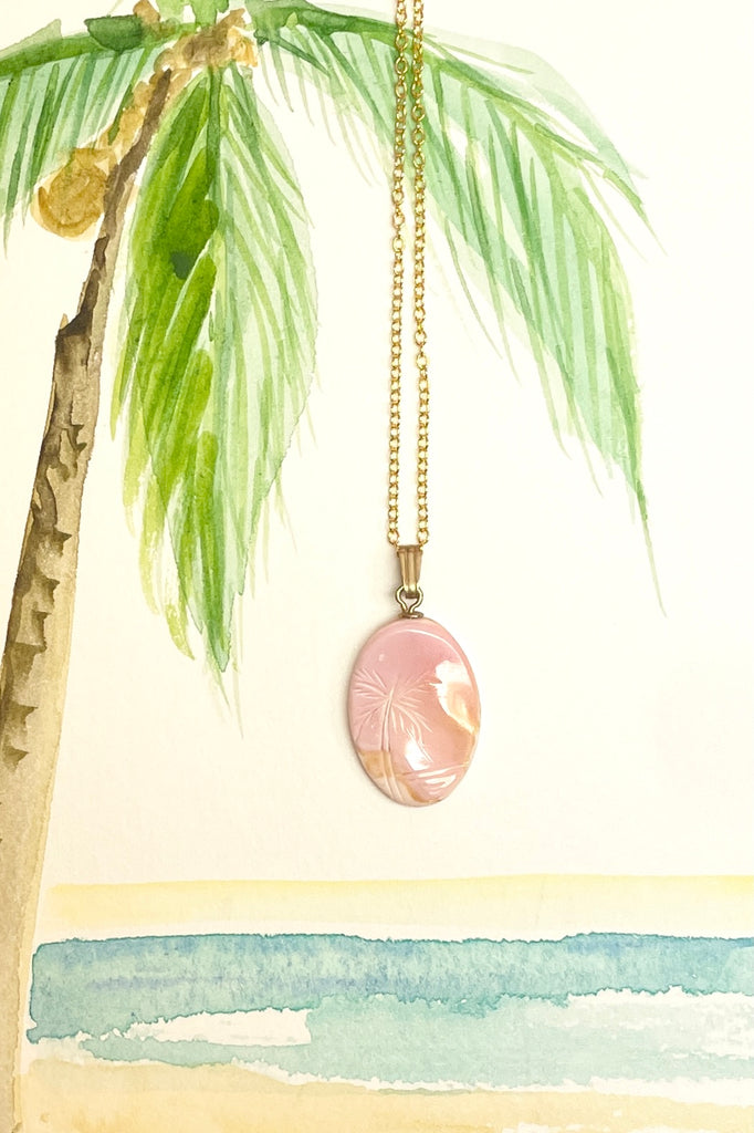 Rare pink conch shell hand carved into an island style. Comes on a gold vermeil chain