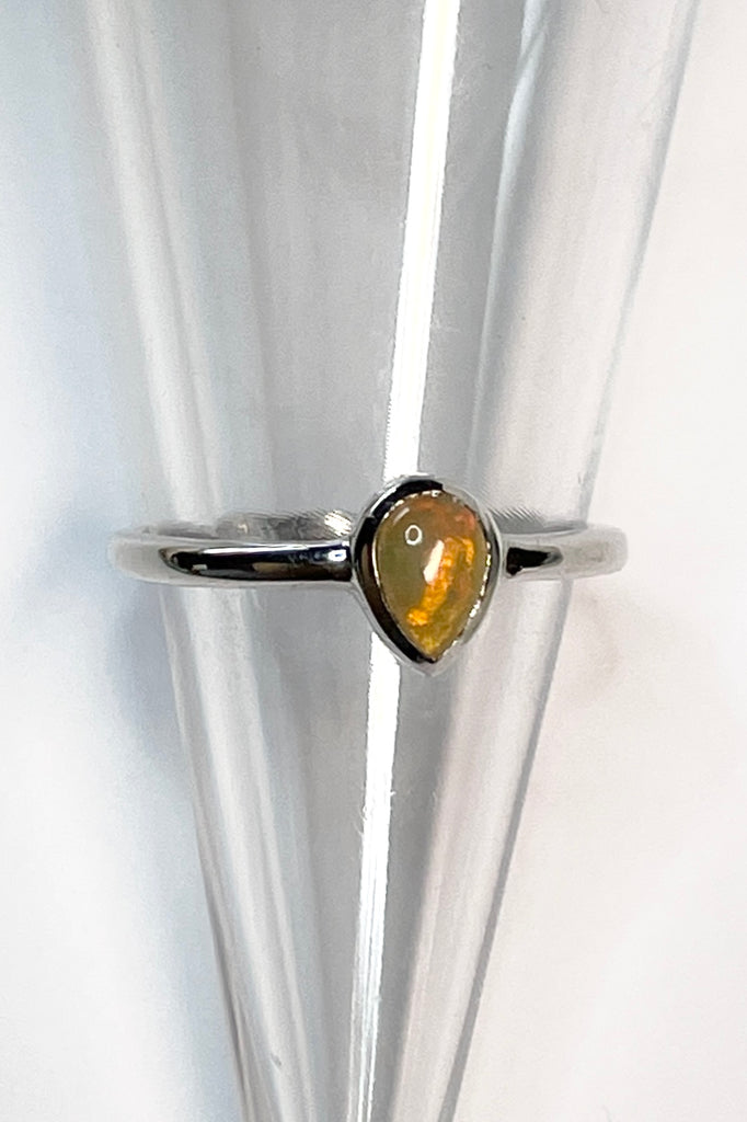 A pretty and luminescent opal gemstone, this darling and dainty little ring is simply perfection, the opal is from Ethopia in Africa, the flashes of colour are so pretty.
