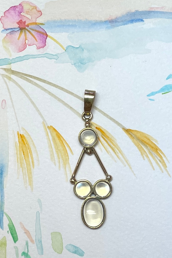 unusual Vintage pendant has four Mexican Opal cabachons set in 9ct gold.  This pendant has been handmade 