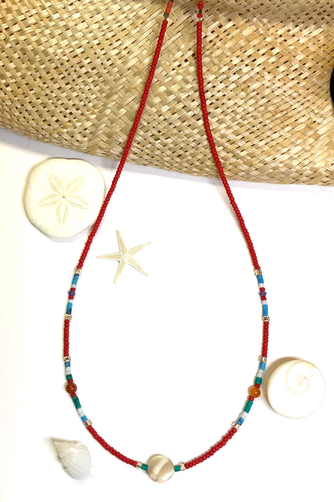 Necklace Cay Island Green is exclusive and handmade featuring 45cm in length and tiny Afghan seed beads, Mother of Pearl, glass and carnelian stone.