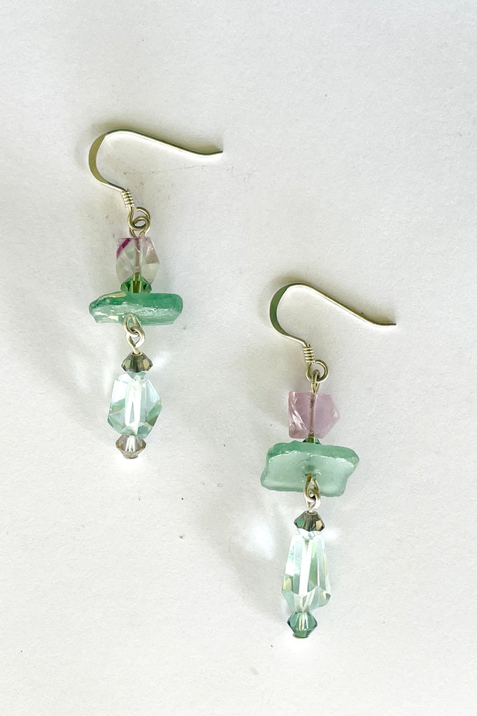 Hand cut antique glass set off with pale aqua Fluorite and swarovski crystal beads.