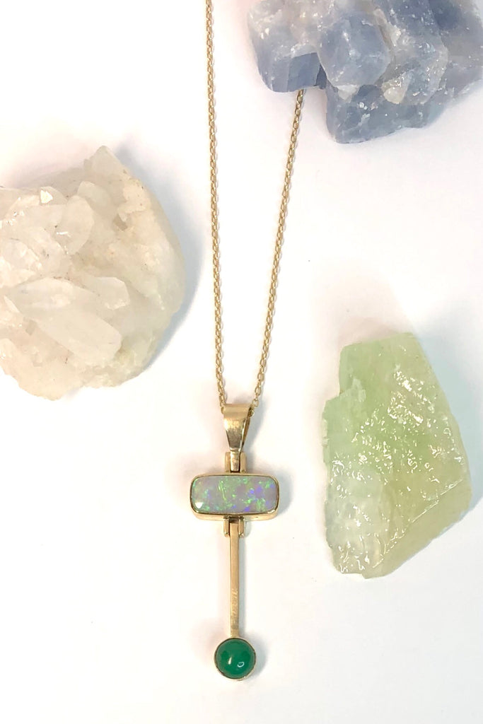 This really cool Vintage pendant features a stunning solid Australian Opal with hanging bar which has a deep green Queensland Chrysoprase cabochon detail.