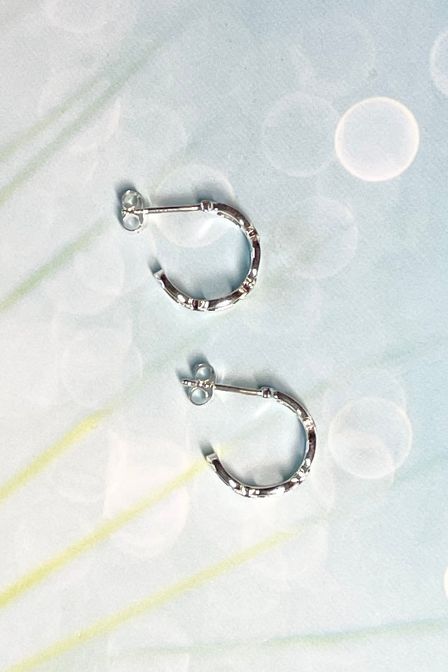 Perfect silver earrings formed as a tiny chain hoop in 925 Silver, a perfect lightweight everyday earring with a hint of sophistication