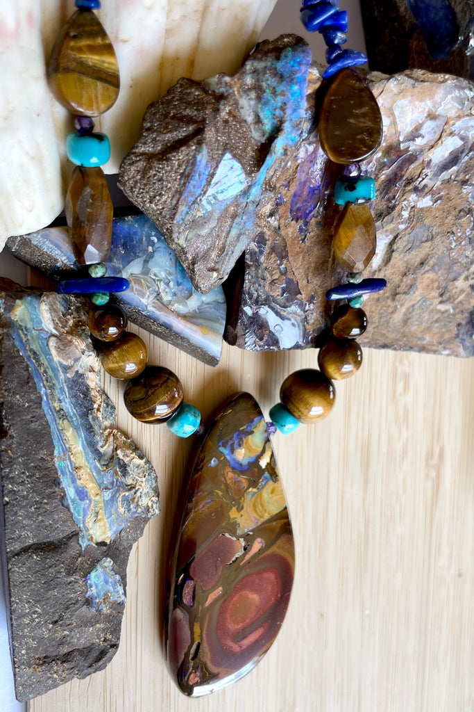 This necklace has been designed using natural Opal and many different semi precious gemstones