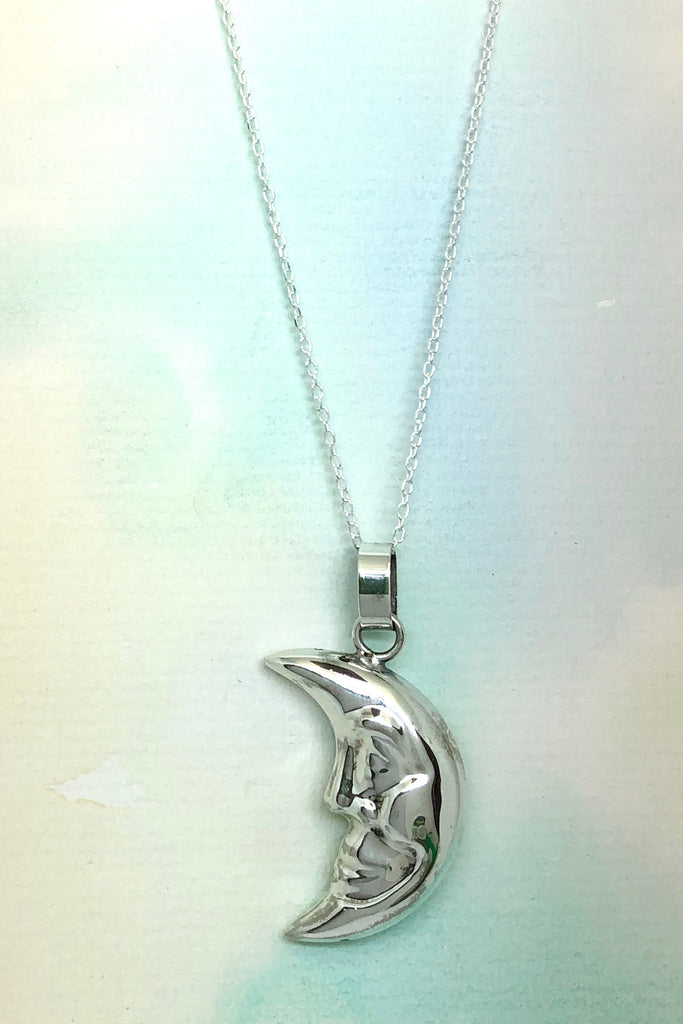 This Echo Man in the Moon Pendant is a vintage 925 silver pendant featuring a faced moon.