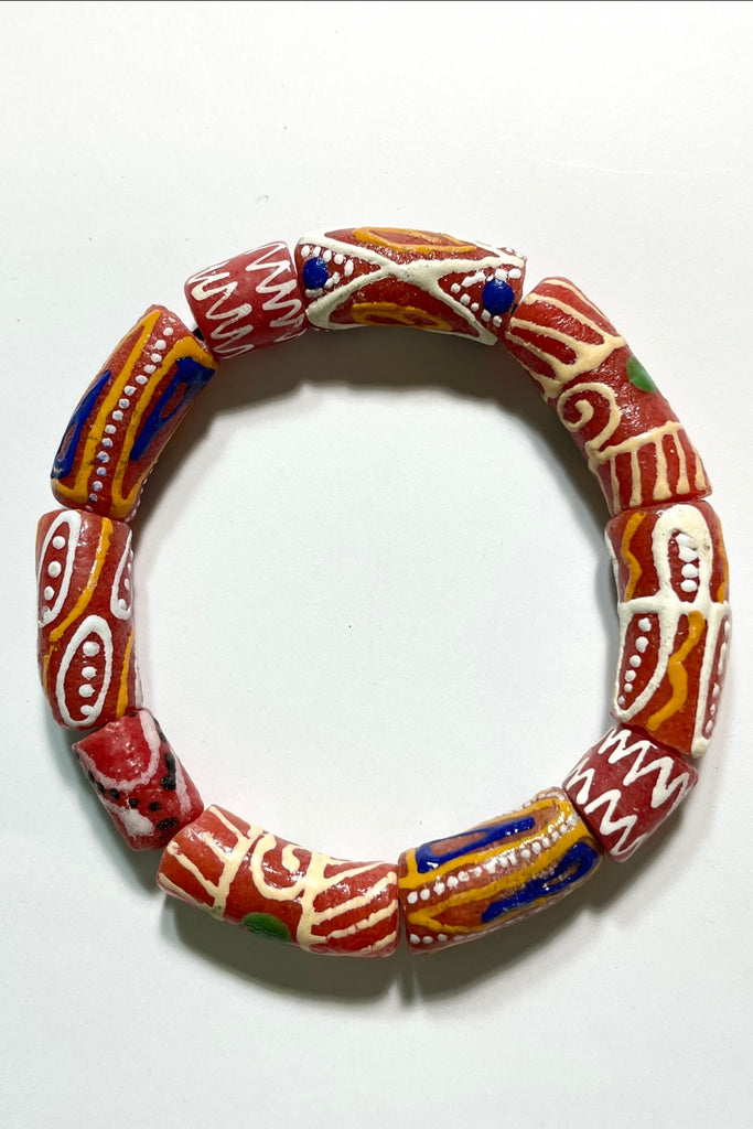This bracelet was made by combining a unique combination of African Beads. Beads are strung on an elastic cord which will stretch over your wrist or ankle. 