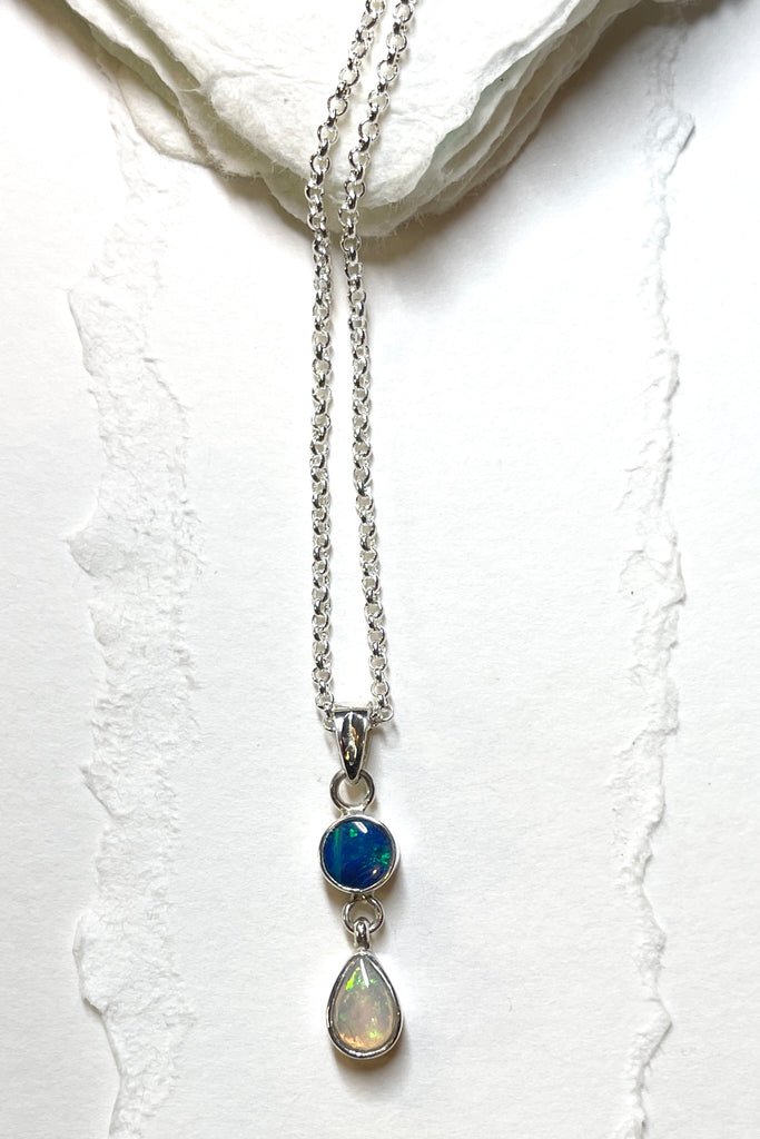 This lovely one off pendant featuring two lovely opal gemstones. Set in solid 925 silver.