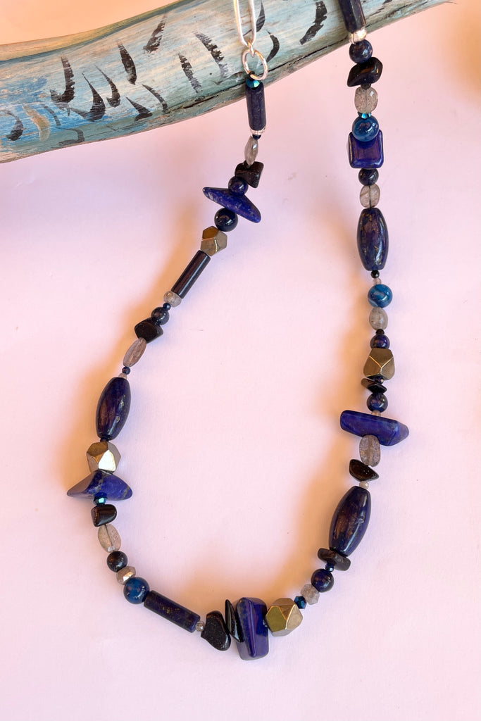 a sweet choker style hand made using an assortment of blue gemstones. These include Lapis Lazuli, Agate, Labradorite and natural Pyrite