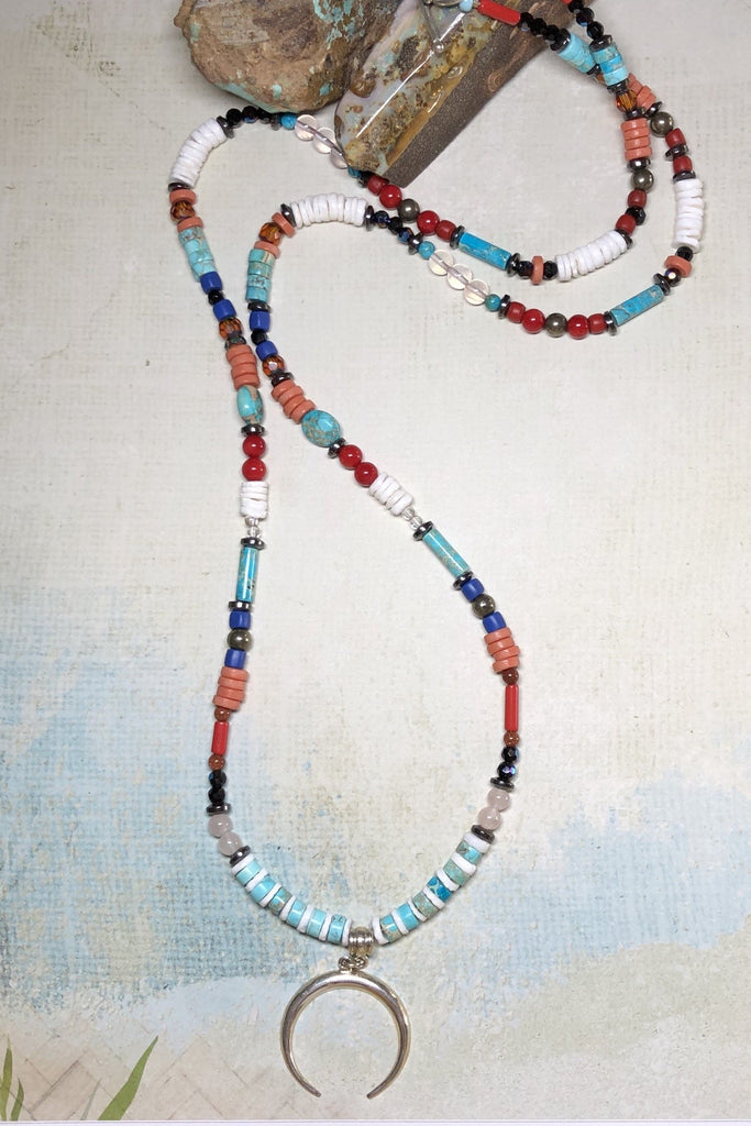 A powerful gemstone necklace with natural stones. Perfect to wear with chic boho luxe clothing an exclusive design