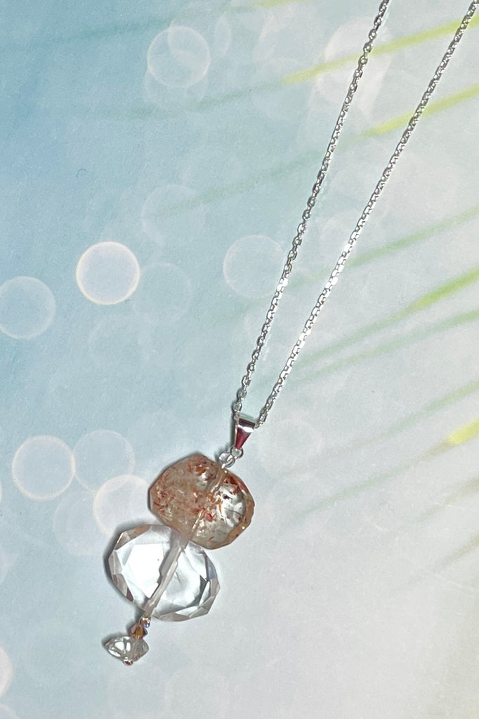 A pretty pendant of Strawberry Quartz that has been flat cut and faceted to reveal all the lovely glittery inclusions hidden inside.