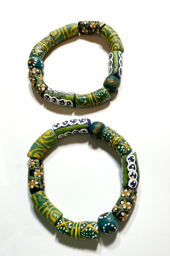 This bracelet was made by combining a unique combination of African Beads. Beads are strung on an elastic cord which will stretch over your wrist or ankle. 