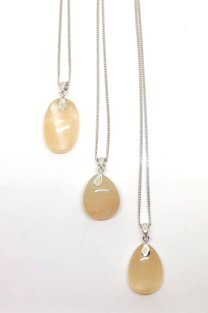 The Pendant of Golden Rutilated Quartz on a Silver Chain 1  will bring through intense energy featuring 3.5 cm length and coming on a silver chain.