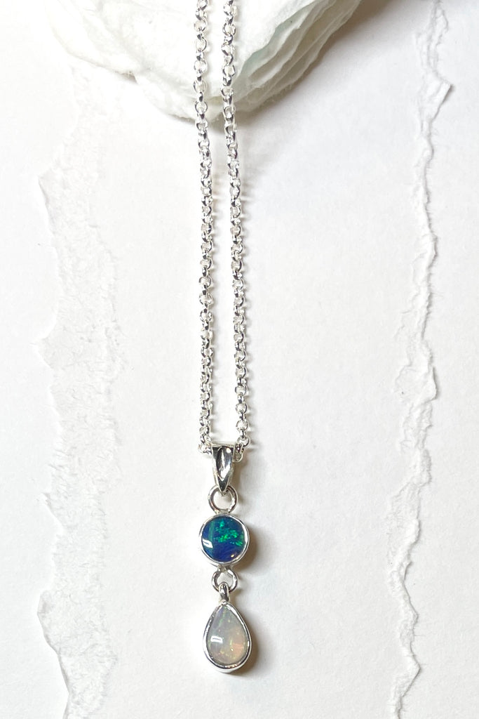 This lovely one off pendant featuring two lovely opal gemstones. Set in solid 925 silver.