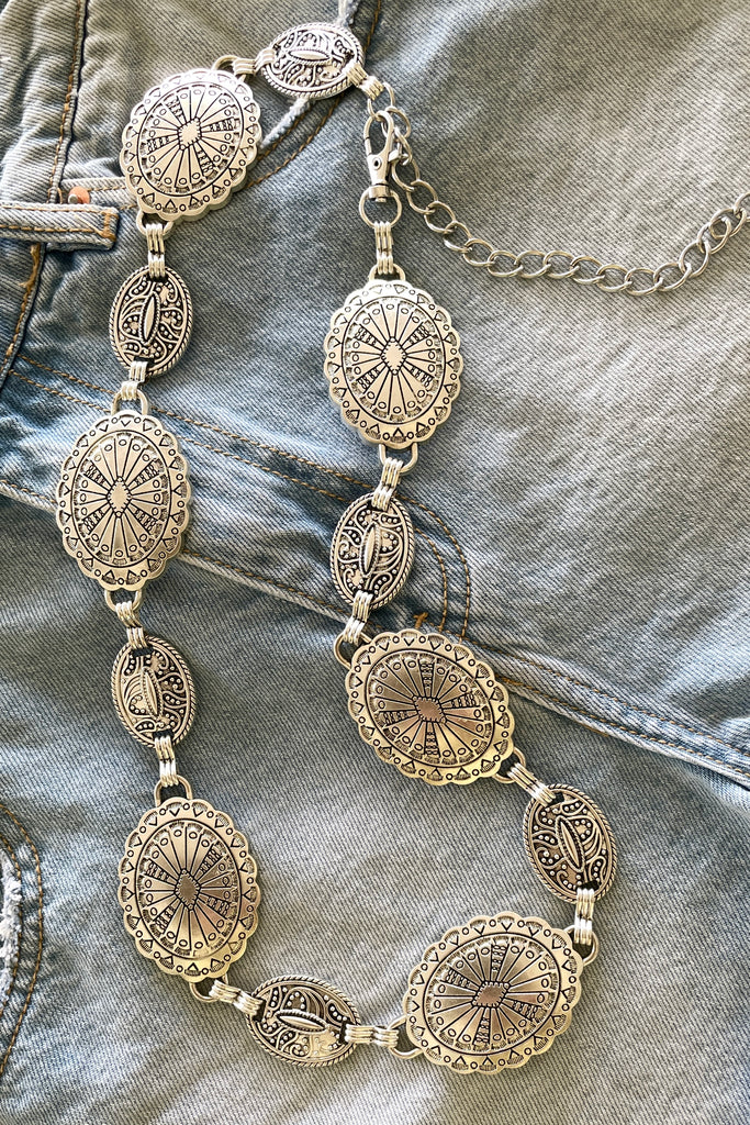 Our Santa Fe style Conch belt has gorgeously patterned discs it is sure to please the bohemian cowgirl.