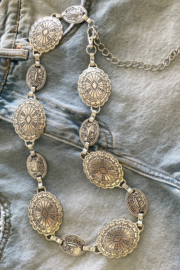Our Santa Fe style Conch belt has gorgeously patterned discs it is sure to please the bohemian cowgirl.