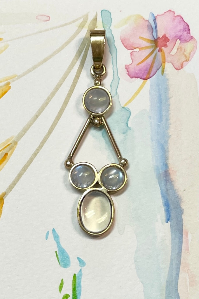 unusual Vintage pendant has four Mexican Opal cabachons set in 9ct gold.  This pendant has been handmade 