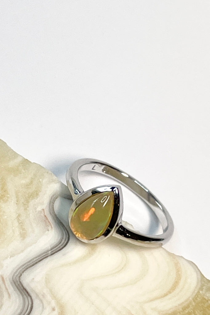 A pretty and luminescent opal gemstone, this darling and dainty little ring is simply perfection, the opal is from Ethopia in Africa, the flashes of colour are so pretty.