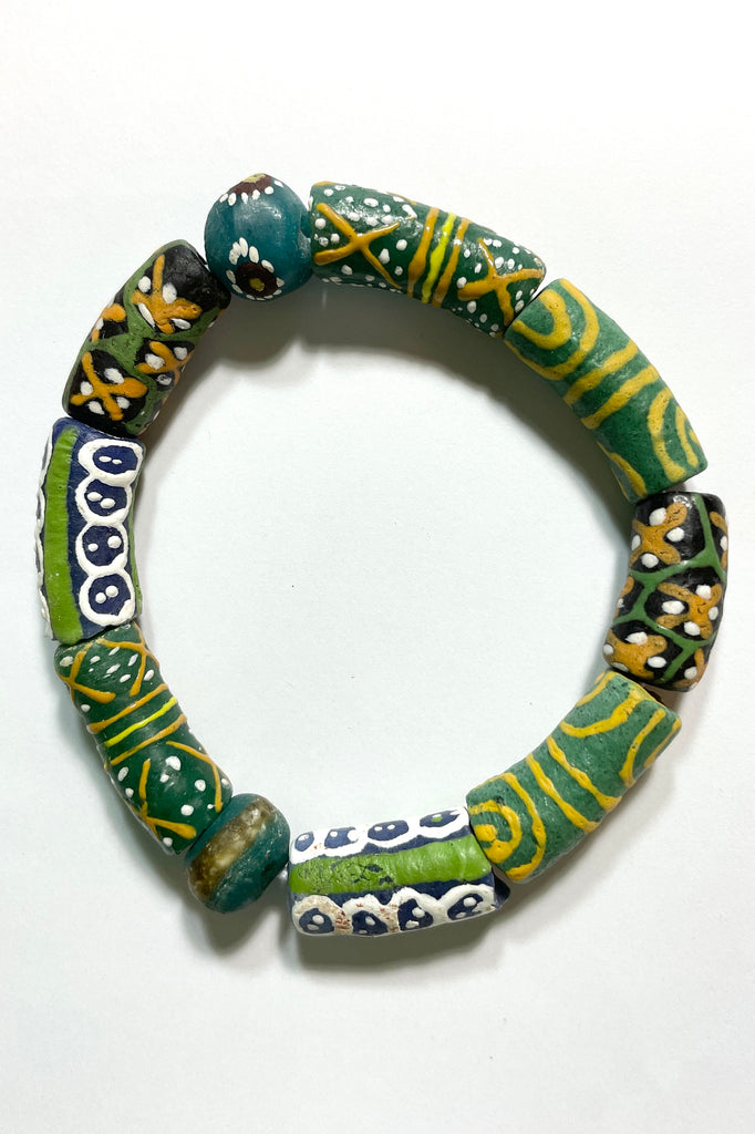 This bracelet was made by combining a unique combination of African Beads. Beads are strung on an elastic cord which will stretch over your wrist or ankle. 