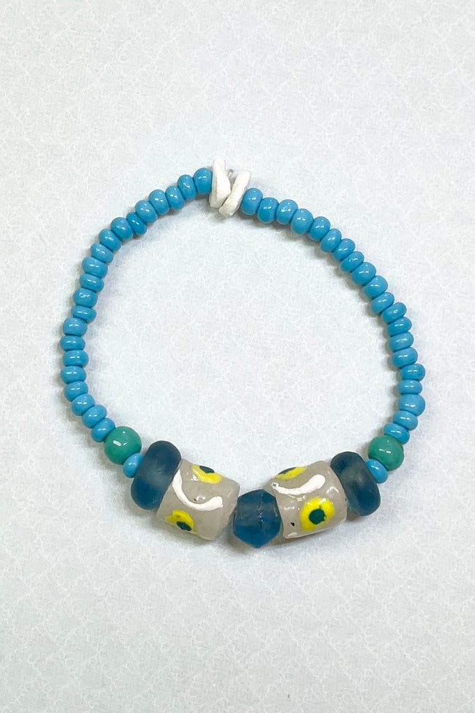 This bracelet was made by combining a unique combination of recycled glass African Beads