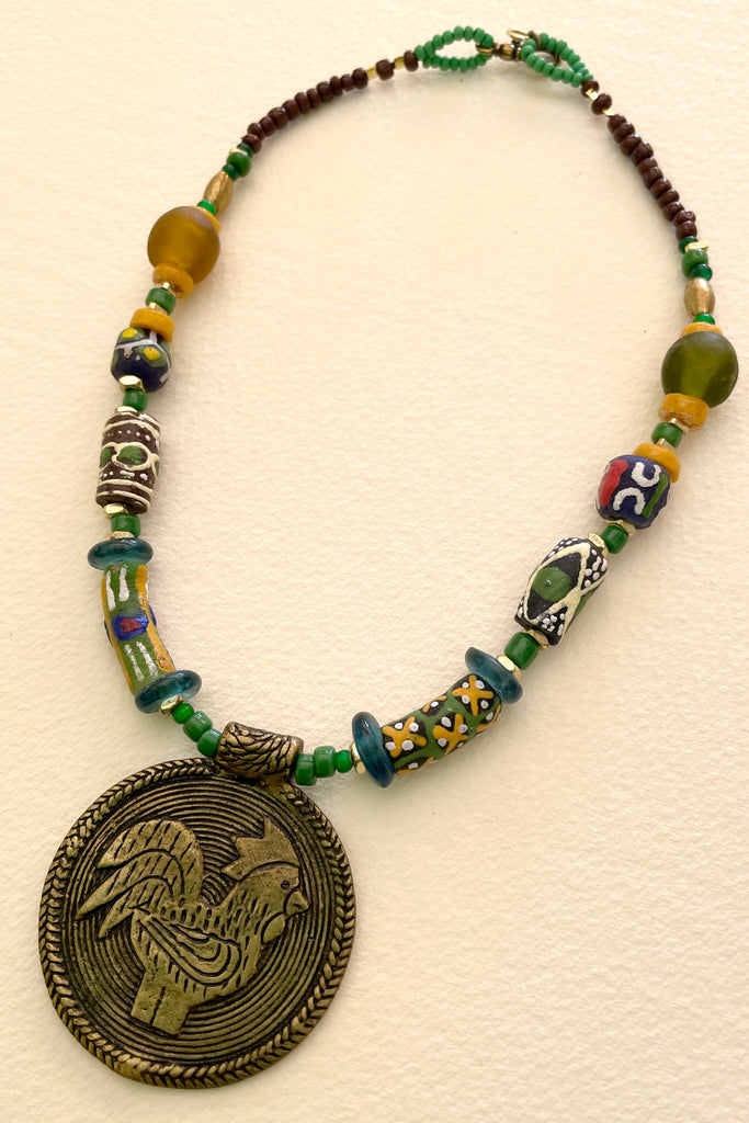 This necklace is from our exclusive range of jewellery highlighting the beautiful African recycled powder glass beads made by the people of Krobo Mountain in Ghana, West Africa.