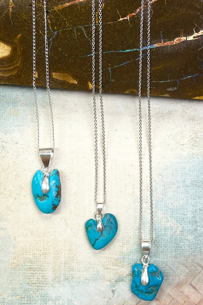This lovely old turquoise pendant is a one off piece, hand carved into a rough heart shape