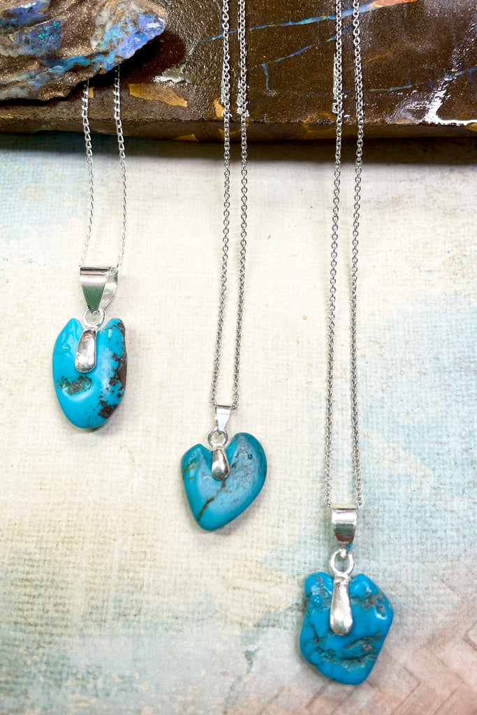 This lovely old turquoise pendant is a one off piece, hand carved into a rough heart shape