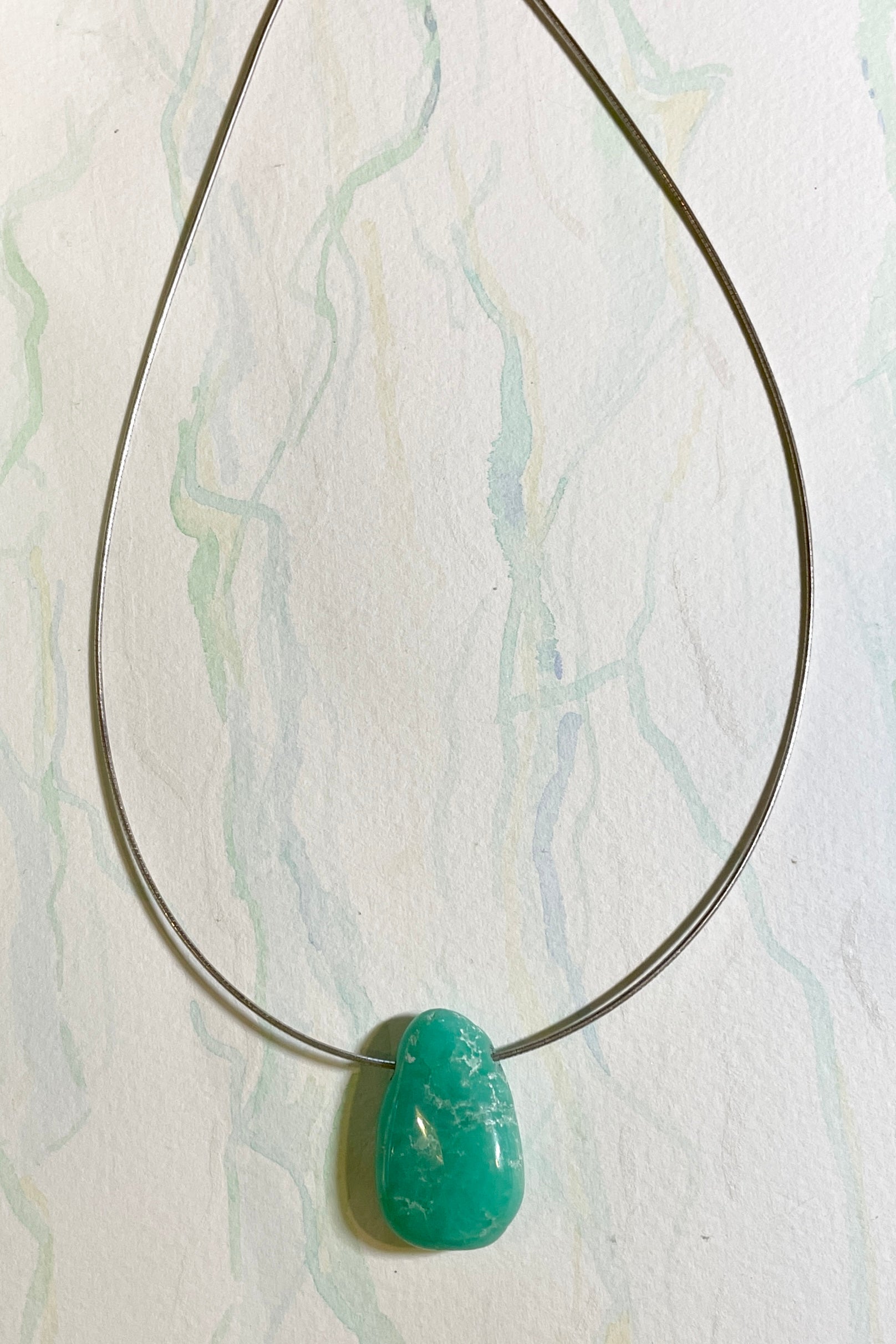 Green on sale gemstone pendant