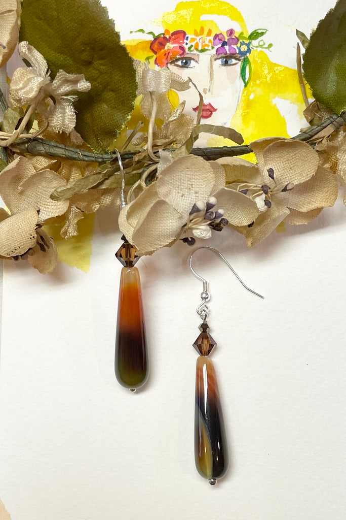 Teardrop style earrings are in coloured agate stone