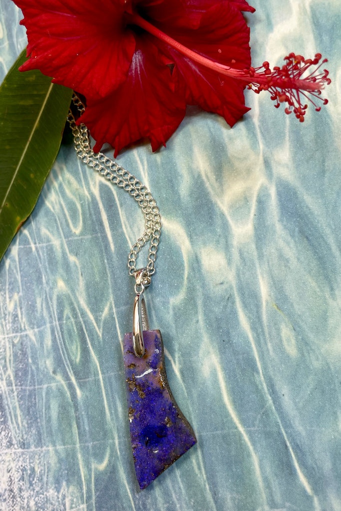 This is a one off piece, a hand cut opal, it shows the mark of the artist who cut and polished the stone. This genuine Australian Opal pendant stone was cut and polished in Australia. 