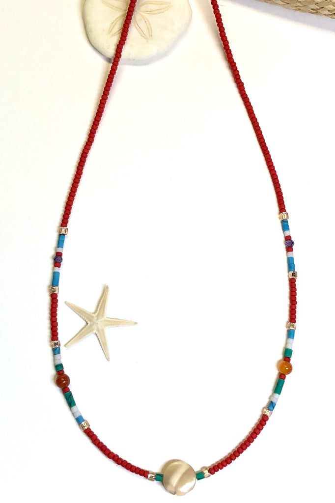 Necklace Cay Island Green is exclusive and handmade featuring 45cm in length and tiny Afghan seed beads, Mother of Pearl, glass and carnelian stone.