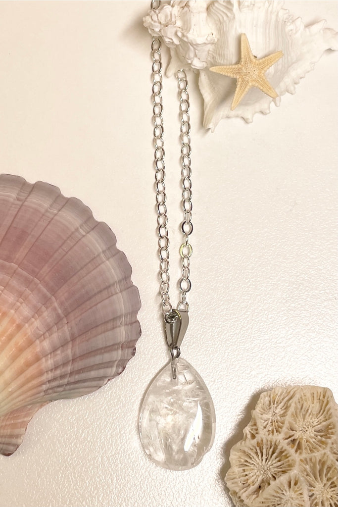 rock crystal droplet pendant is cut from natural stone.