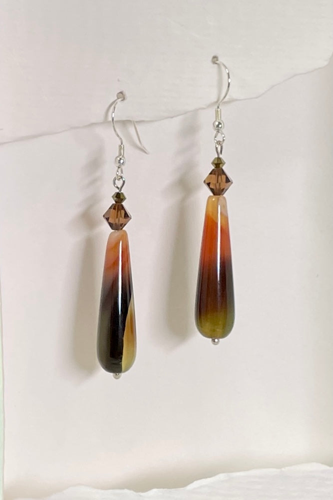Teardrop style earrings are in coloured agate stone