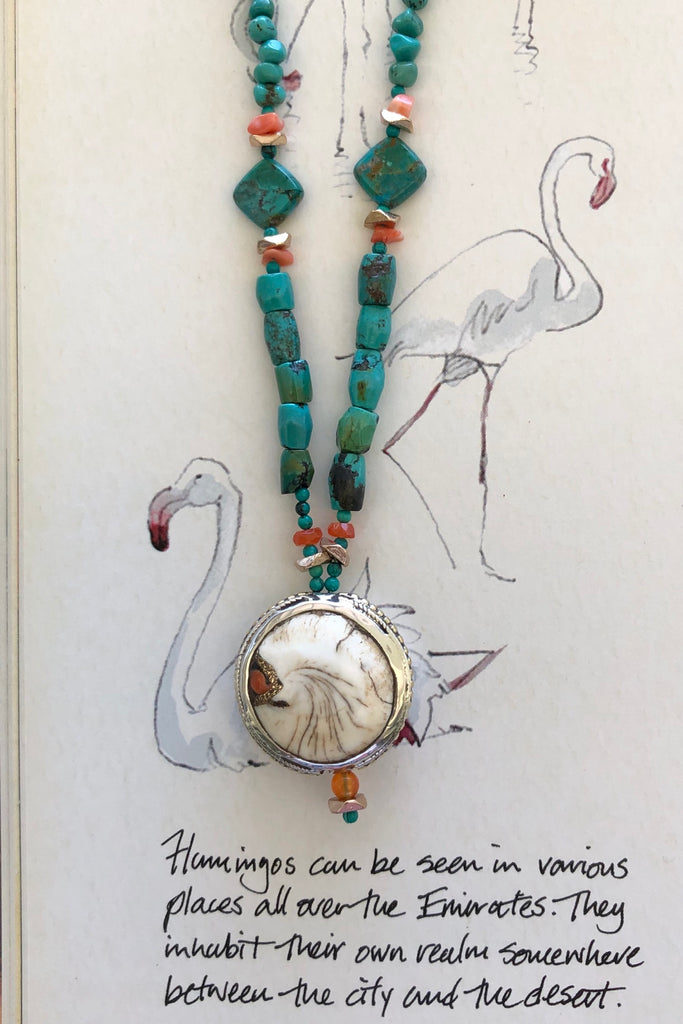 The centre piece is an inlaid Naga conch shell bead from Tibet. The beads are all genuine natural Turquoise, very irregular and some are very old.