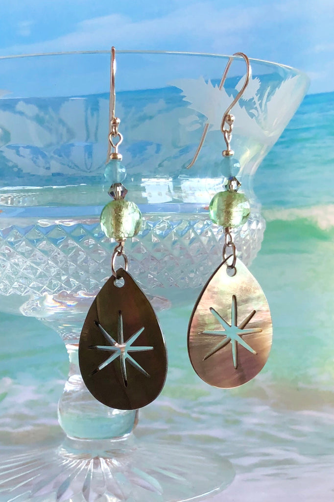  Earrings Serendipity Starburst silvery grey Shell are handmade exclusively for us in Noosa. The luminescent Mother of Pearl shell has been hand cut and polished. 
