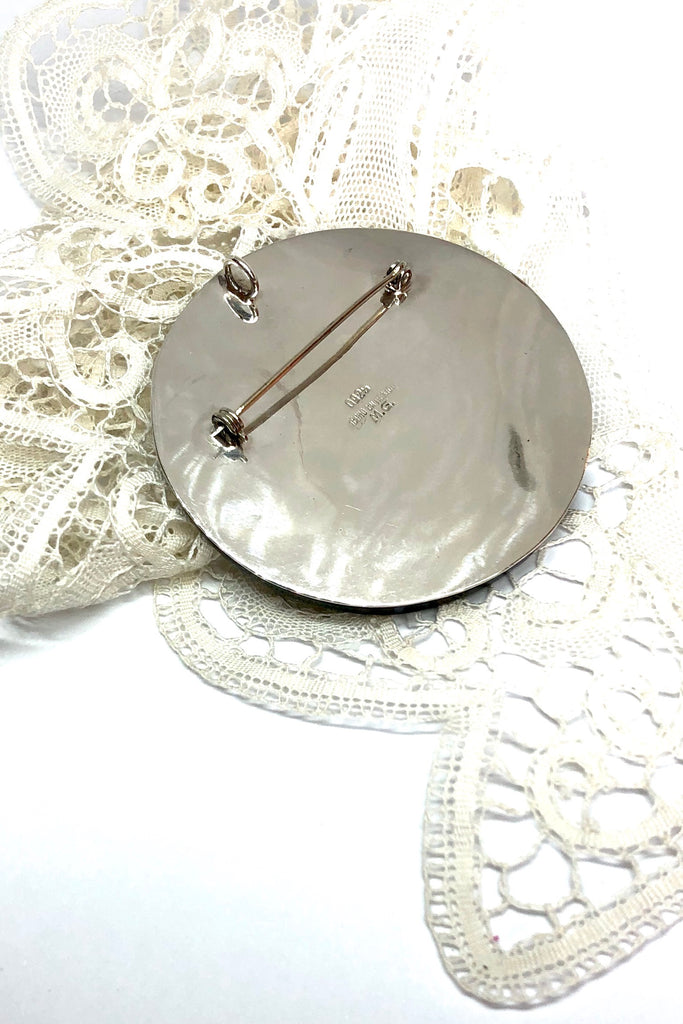 brooch will add some Mexican mythology to your wardrobe. Handmade with silver warrior figure on the front and silver back.