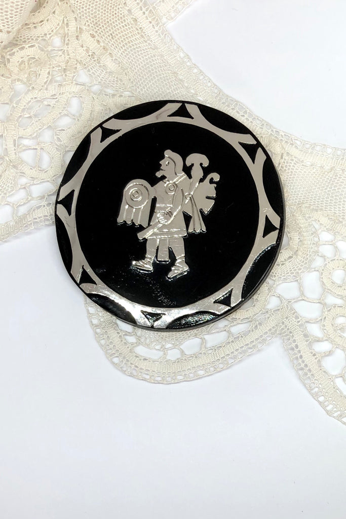 brooch will add some Mexican mythology to your wardrobe. Handmade with silver warrior figure on the front and silver back.