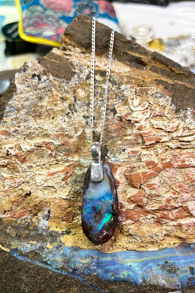 Australian Opal is from Winton, this intriguing piece of Boulder Opal was mined, cut and polished in Queensland.